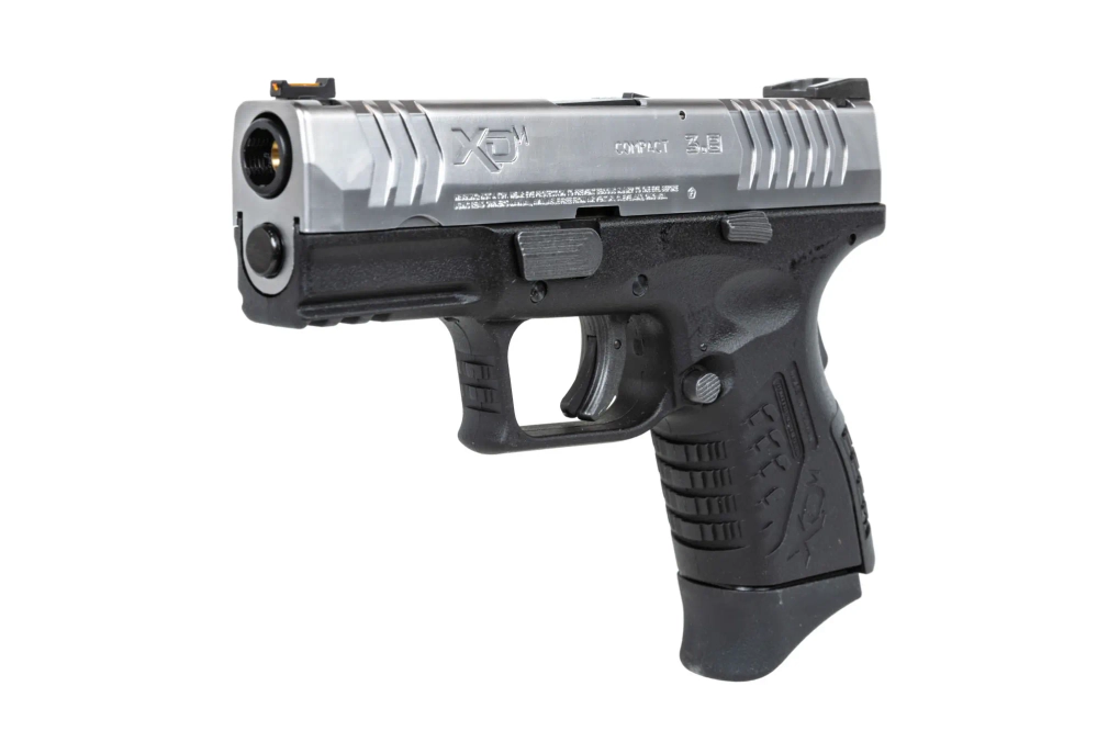Pistola Cybergun x Springfield XDM 3.8" Compact airsoft Negro y plata
