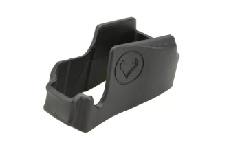 Anti-skid overlay for the magazine well